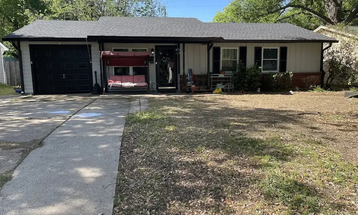 Hail Damage Roof Repair crew at work on a residential roof in Moss Point